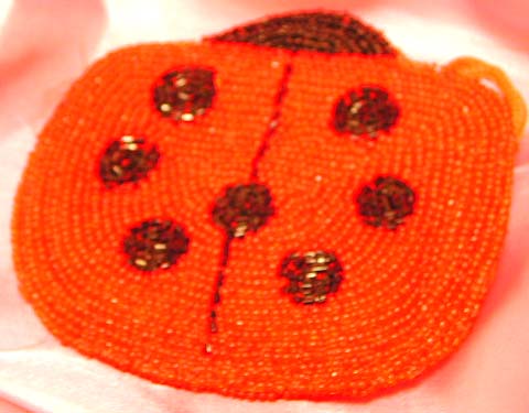 Fashion beaded bag of lady bug pattern design, a latest fashion and design wholesale manufacture. An eyes-catching piece you can't never seen!