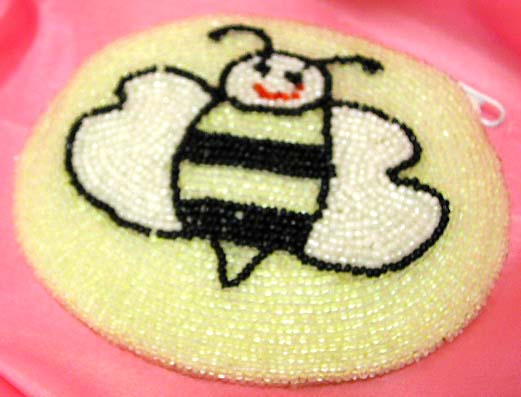 Light yellowish rounded fashion beaded purse with happy bee pattern design 
