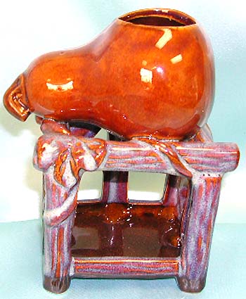 Brown pot with empty top style ceramic oil warmer with tree stem stand. Cool, neat, eyes-catching piece for your unique design home decoration!